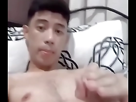 Young Asian men having sex and ejaculating