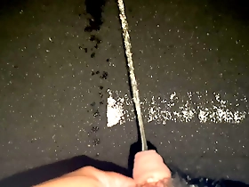 Solo boy enjoys urinating outdoors at night