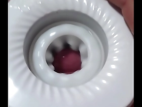 Gay Japanese man masturbates with a toy and ejaculates.