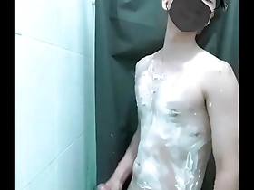 Cumshot from an Asian boy with marbles in his vagina