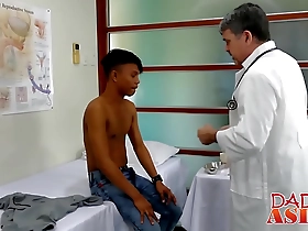 Asian twink gets wild with doctor Mike in a hot interracial scene.