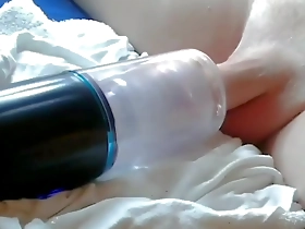 Shaved pussy gets toyed with in a fetish filled scene.