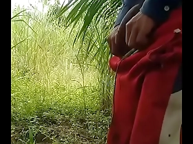 Gay Asian man masturbates outdoors