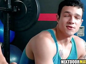 Muscular men having hot gay sex in the gym