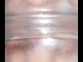 Gay Asian man uses fleshlight with sucking and cock stimulation.