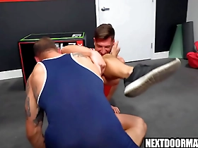 Gay wrestlers engage in hot anal sex without the use of a condom.