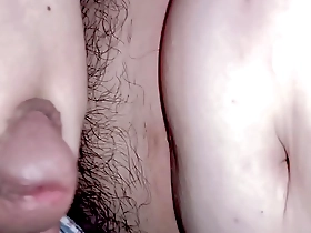 Young Asian man pleasuring himself in a room.