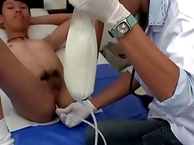 Medical examination turns into a hot scene with an Asian twink.