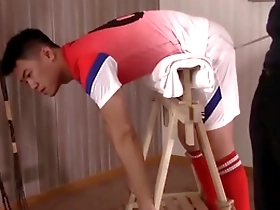 Gay club scene with an Asian boy getting spanked by his dad