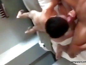 Gay cam boy performs a hot hotel room blowjob