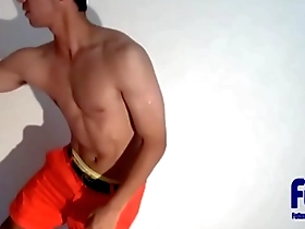 Young and straight sports enthusiast shows off his muscles and short hair.