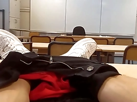 A French-Asian student in a university setting gets horny while studying and decides to have an orgasm in a rather risky manner.