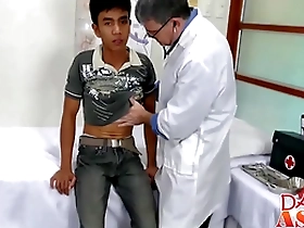 Young Asian boy gets it hard in the doctors room with an older pervert.