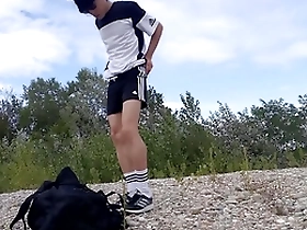 Jon Arteen, the cute Asian twink, in black Adidas attire, freeballing and outdoors.