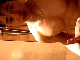 Muscular hunk showing off his body and large penis