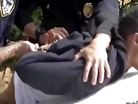Asian police officers in uniform having gay sex with a suspect on the run