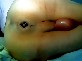 Gay Asian man uses a double dildo for anal sex