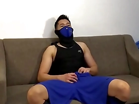 Gay Chinese handsome in mask and action