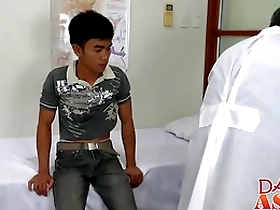 A young Asian man masturbates during a doctor’s appointment and gets a facial.