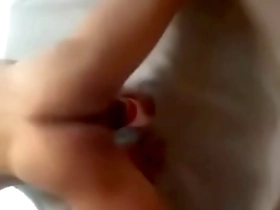 Gay Japanese man masturbates with Tenga toy.