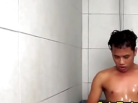 Asian twink enjoys a solo shower with masturbation.