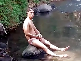 Gay Indonesian man masturbates outdoors in Mexican series